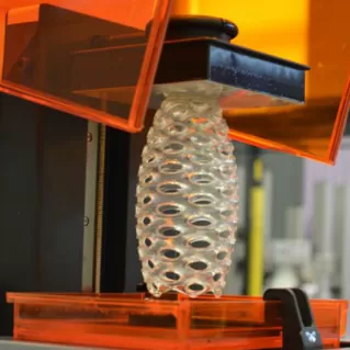 What are the main advantages of using SLA for rapid prototyping?