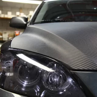 Revolutionizing Automotive Manufacturing: The Art and Science of Carbon Fiber Extrusion
